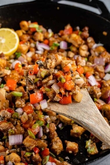 close up of vegan tofu sisig in cast iron skillet