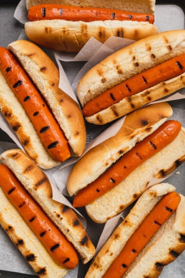 Grilled vegan carrot hot dogs in grilled buns by sweet simple vegan