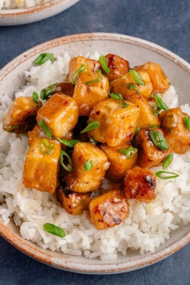 a bowl of rice and sinigang tofu