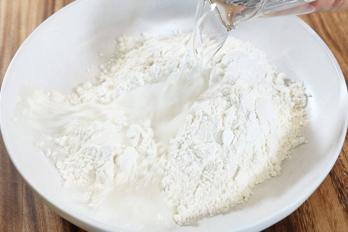 adding water to flour