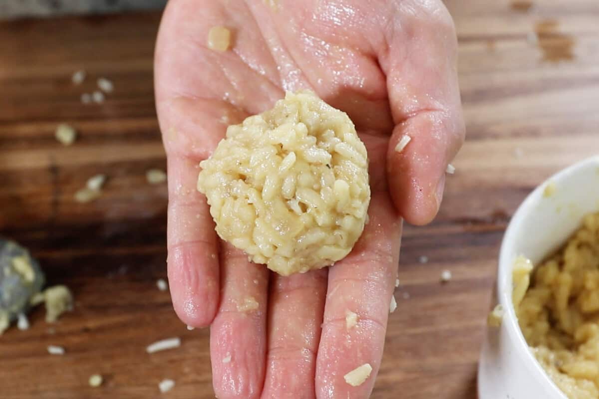 forming a rice ball with hands