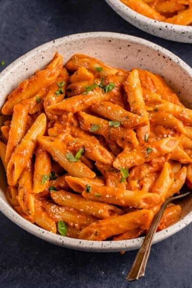 vertical photo of vegan penne alla vodka