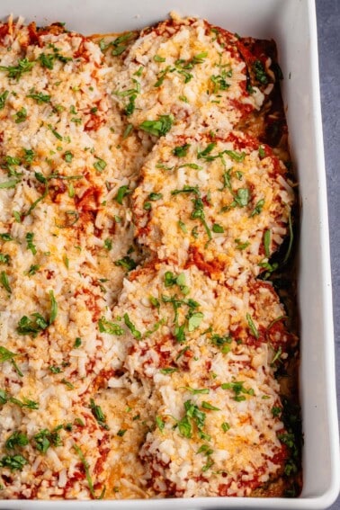 eggplant parmesan with fresh basil on top