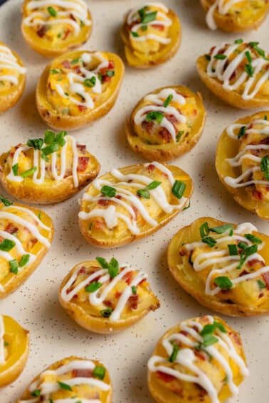 mini twice baked potatoes on a plate